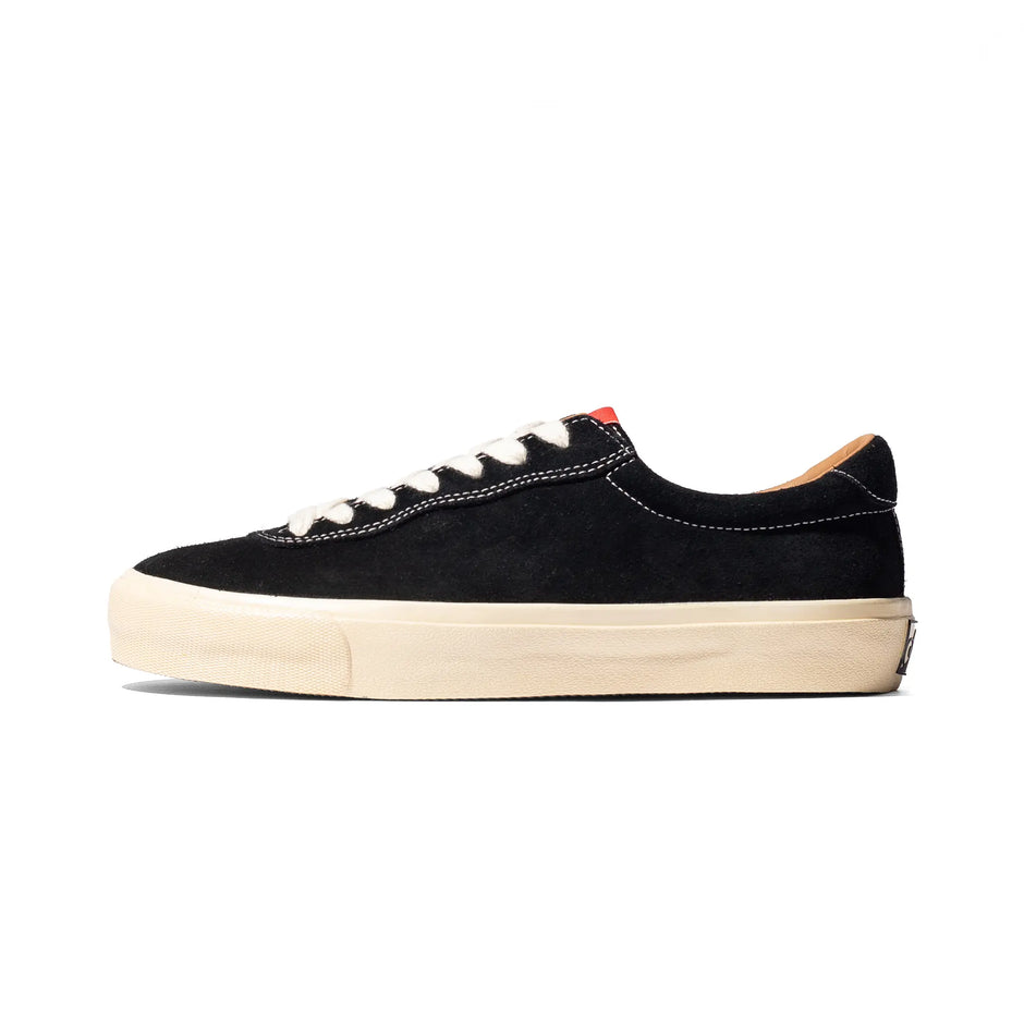 Last Resort AB VM001 Suede Lo in Black / White, side view with black suede upper, white laces and off-white sole.