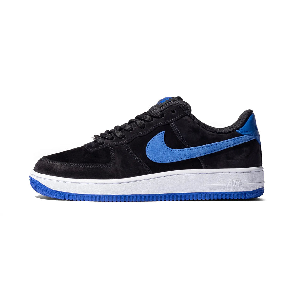 Nike Air Force 1 SE in Black / Game Royal / White, side view showing the blue Swoosh and white midsole.
