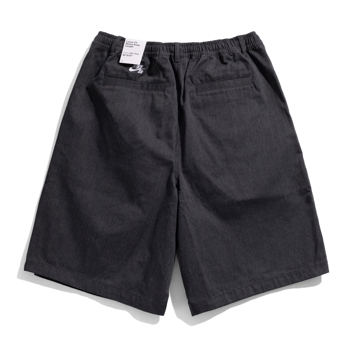 Nike SB Bagel Skate Shorts in Black / White, rear view showing the back pocket.
